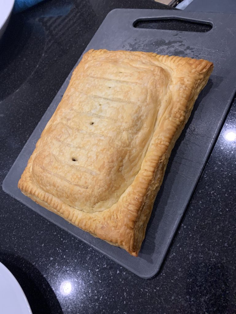 Mushroom & Nut Wellington cooked and ready to serve