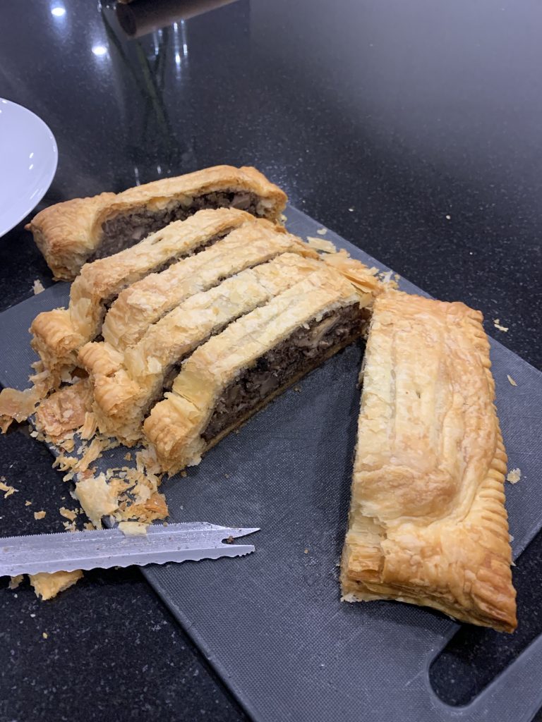 Mushroom & Nut Roast in puff pastry sliced to see inside