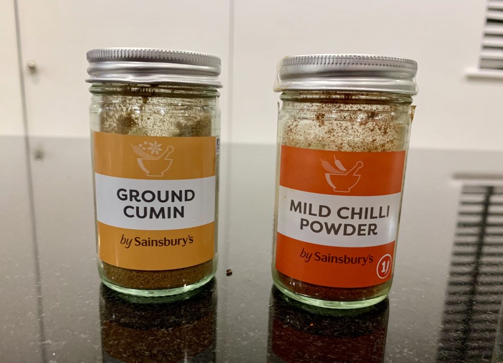 cumin and chilli spice bottles