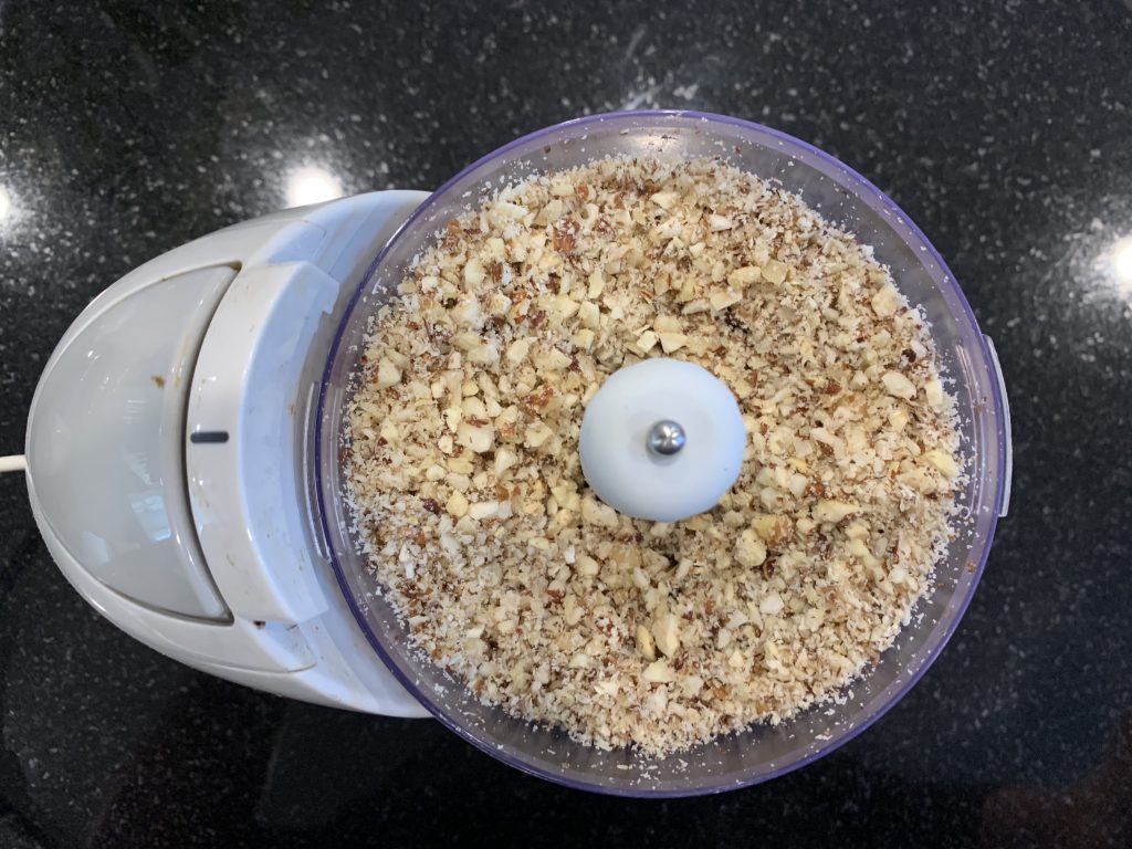 blitz the nuts to a coarse blend