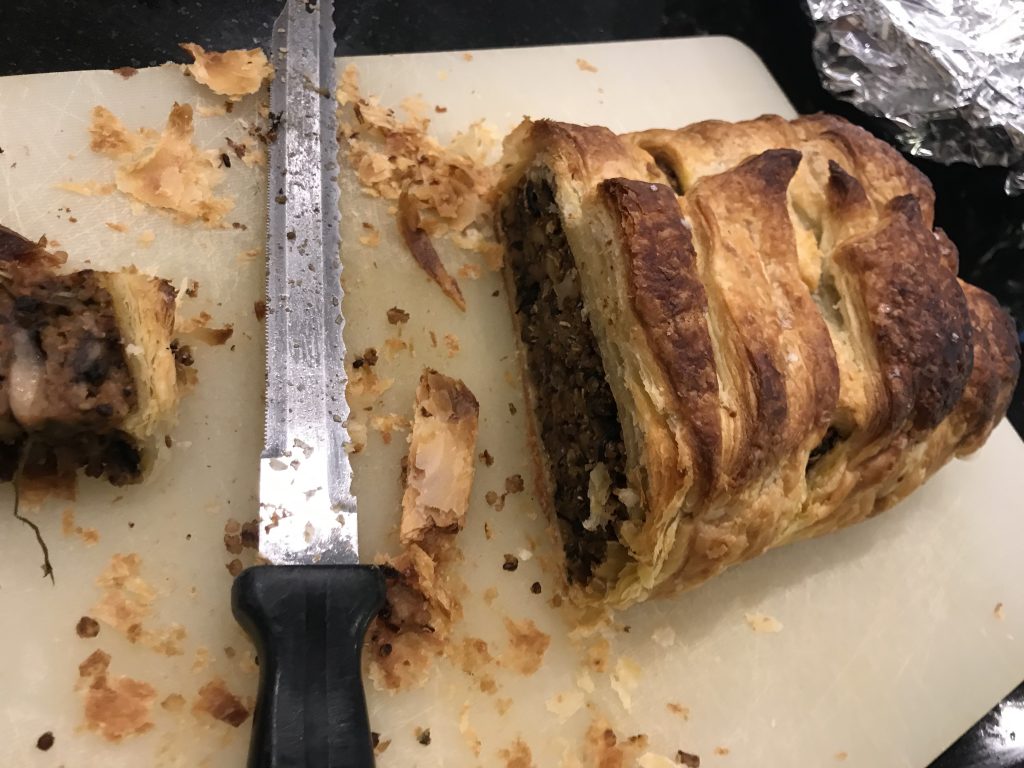Mushroom and nut wellington platted and sliced