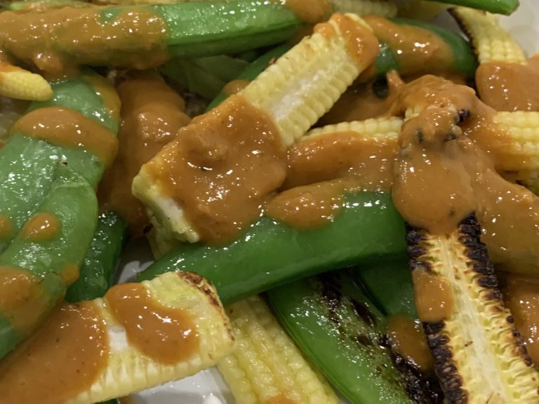 Charred baby sweet corn with peanut sauce
