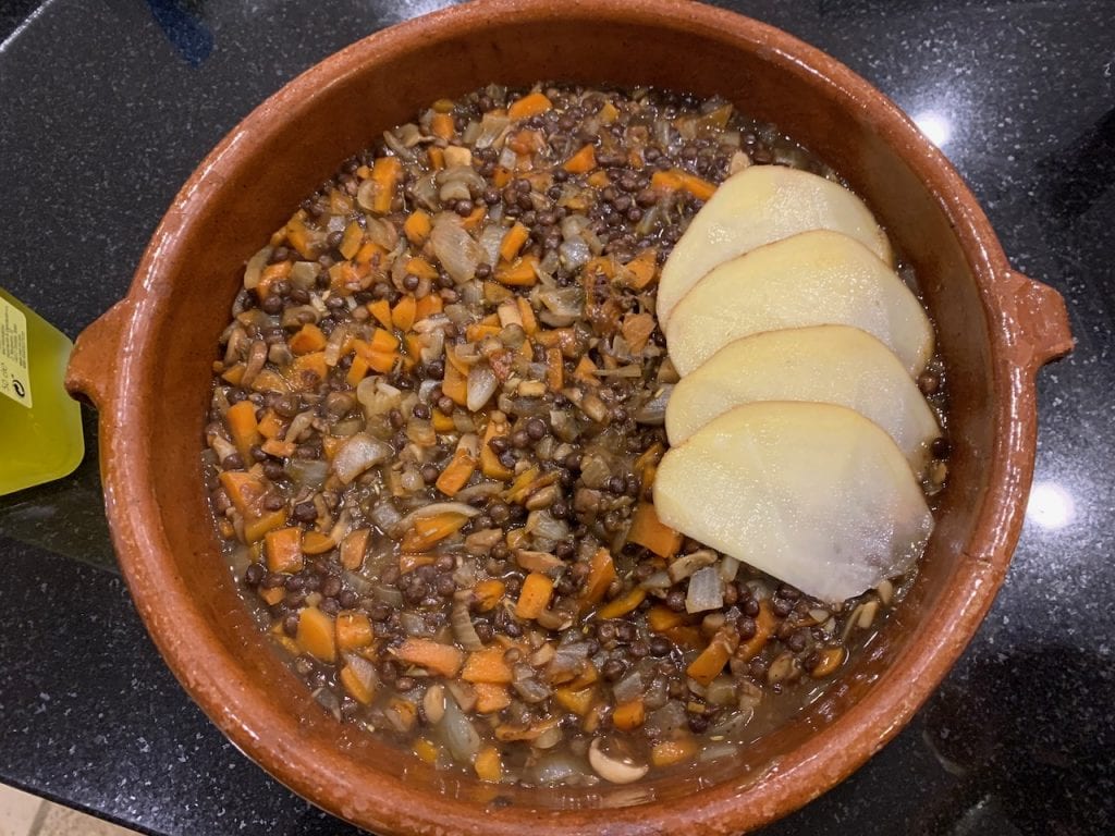 start layering the potato slices