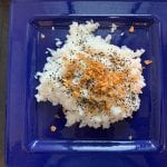 sushi rice with black sesame seeds and crispy onions